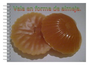 vela en forma de almeja